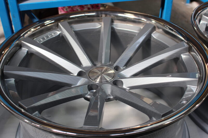Car Alloy Wheels (Vossen) Coated In Carbon Fibre Painted Grey