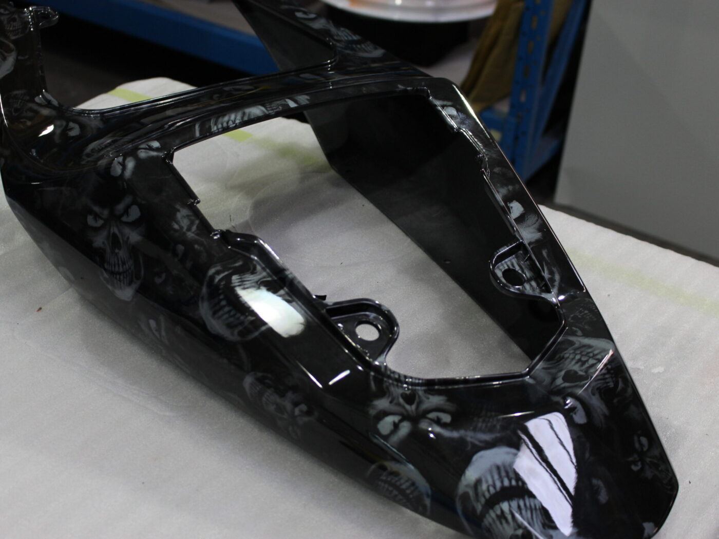 Motorbike parts coated in skulls painted black