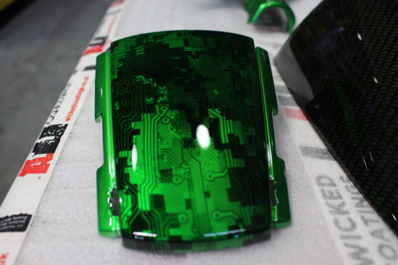 Triumph coated in carbon fibre painted green ( Pool Bike Show )