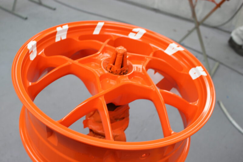 KTM Racing wheels painted white and orange