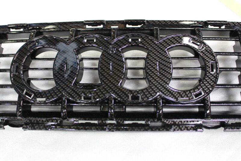 Audi radiator cover coated in carbon fibre