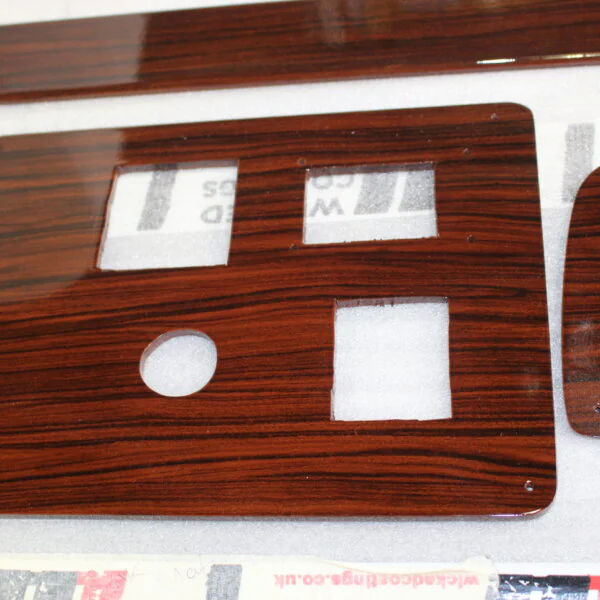 Car Dashboard Elements Coated In Wood