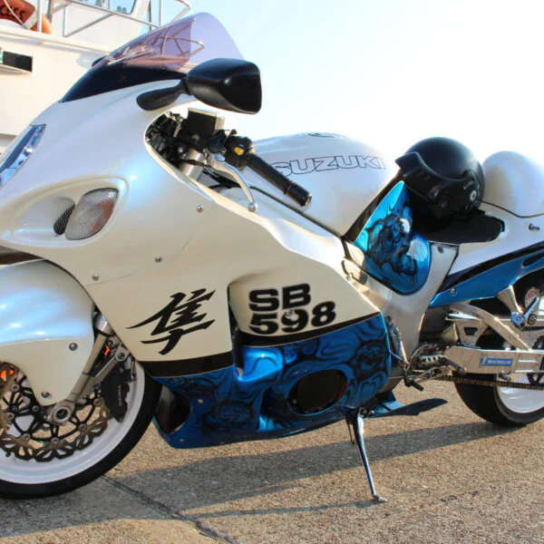 Suzuki coated in skulls painted blue