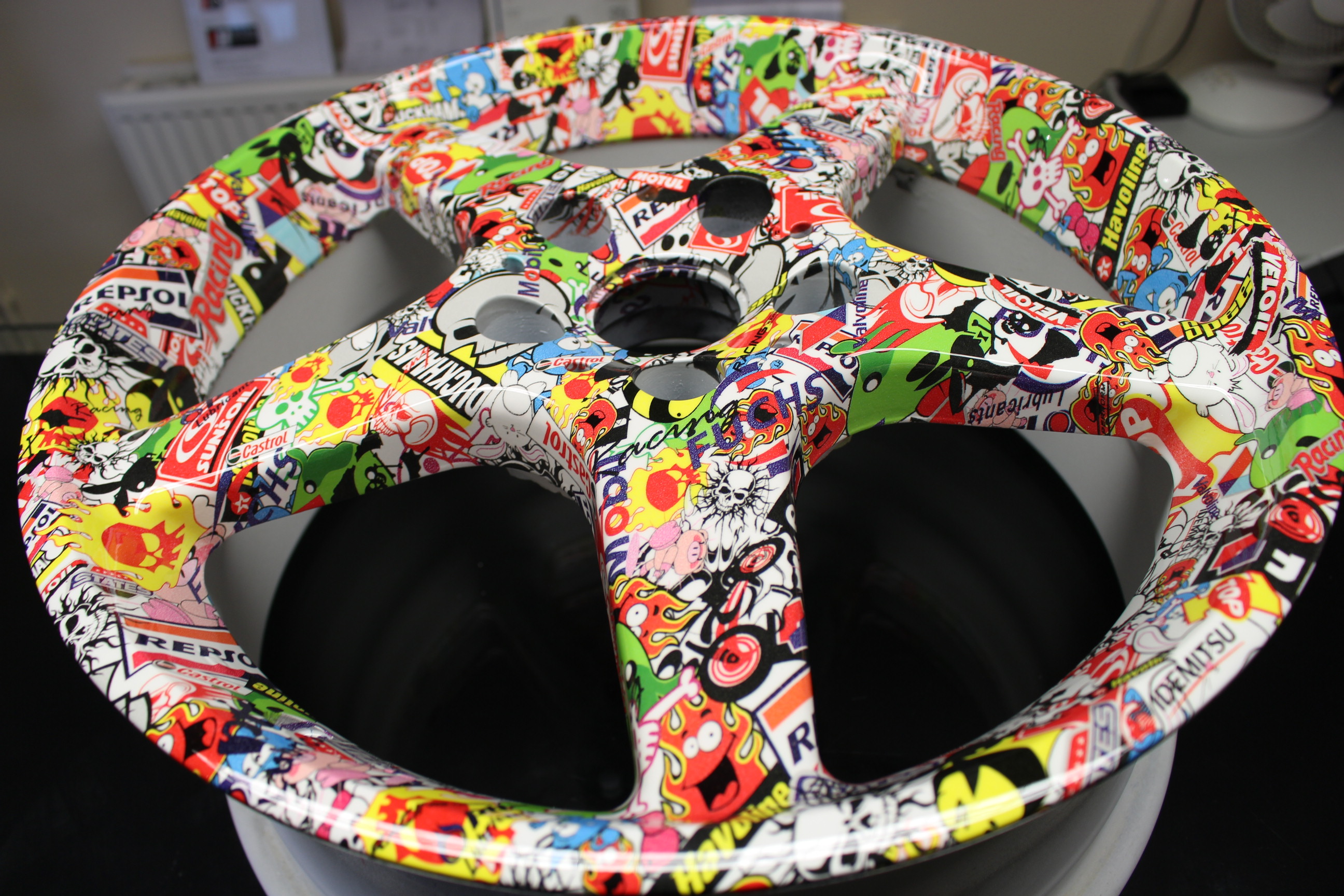Car Alloy Wheels Coated In Sticker Bomb Hydrographic Film
