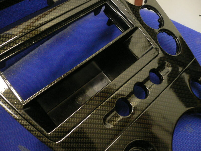 Car interior various elements coated in carbon fibre hydrographic film painted black