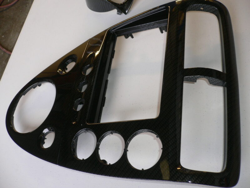 Car interior various elements coated in carbon fibre hydrographic film painted black