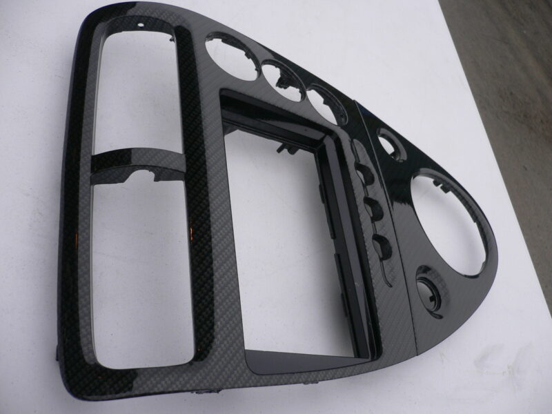 Car interior various elements coated in carbon fibre hydrographic film painted black