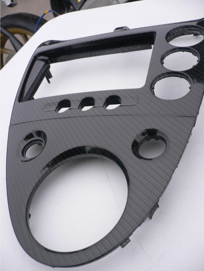 Car interior various elements coated in carbon fibre hydrographic film painted black