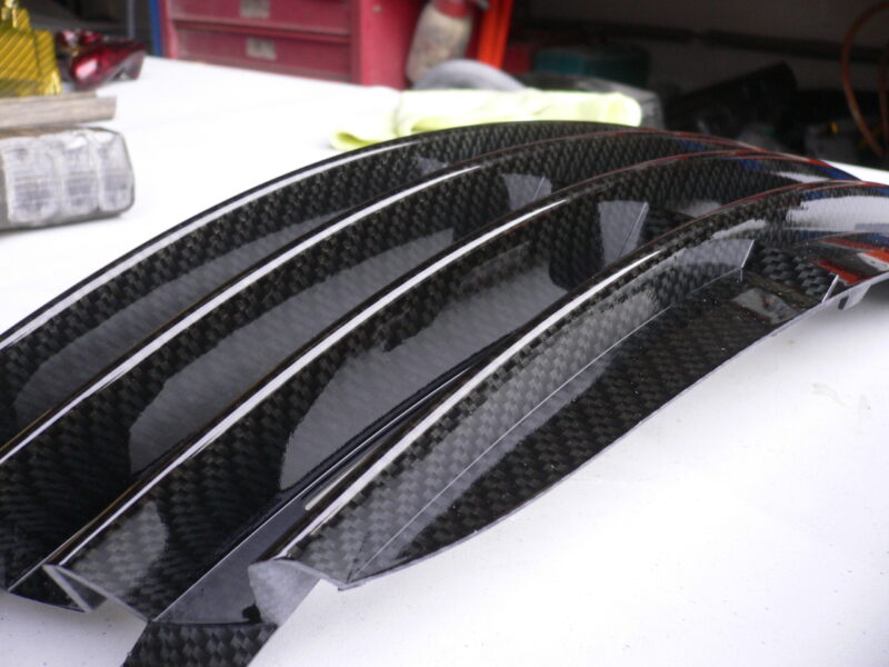 Car radiator cover coated in carbon fibre hydrographic film painted black