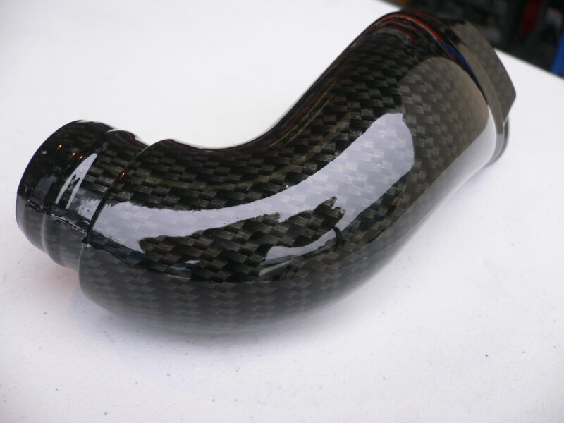 Ford Focus RS engine parts coated in carbon fibre hydrographic film painted black