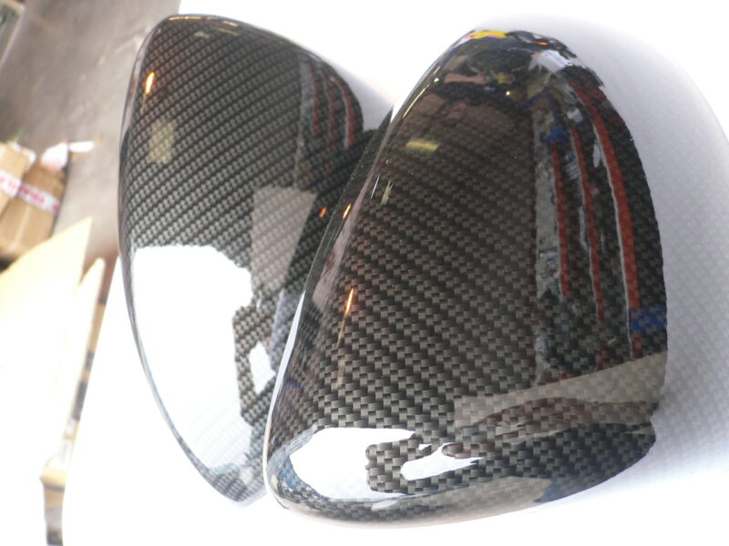 Car mirrors cover coated in carbon fibre hydrographic film painted black