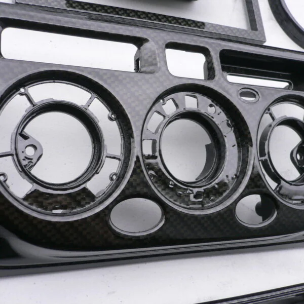 Car interior various elements coated in carbon fibre hydrographic film painted black