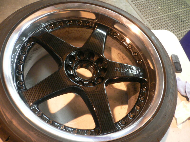 Nismo alloy wheels coated in carbon fibre
