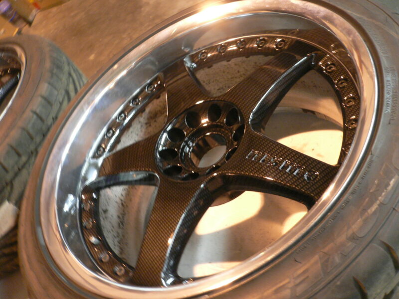 Nismo alloy wheels coated in carbon fibre