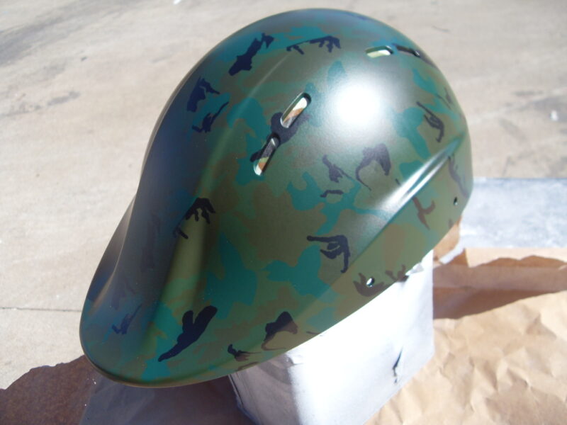 Protective Helmet Coated In Camouflage Hydrographic Film