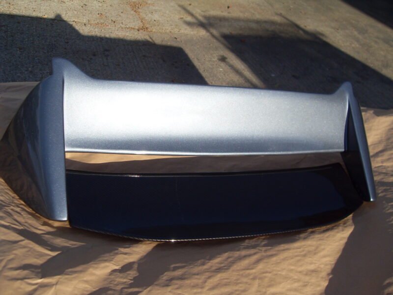 Car exterior parts coated in carbon fibre painted silver