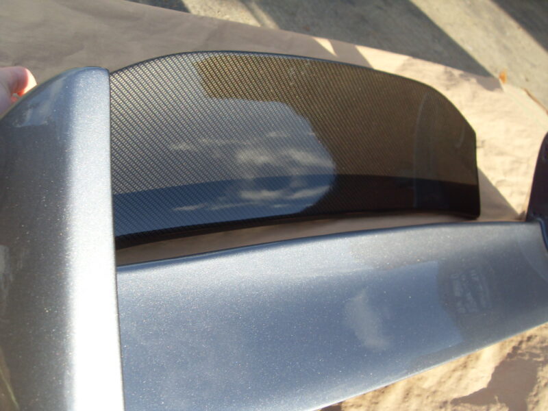 Car exterior parts coated in carbon fibre painted silver