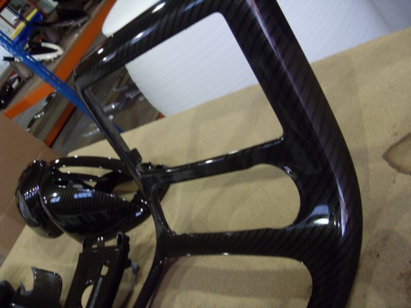 Car interior various parts coated in carbon fibre hydrographic film painted black