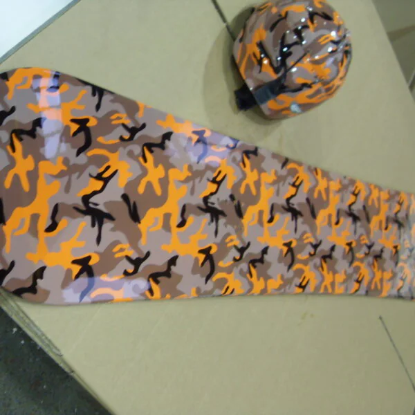 Snowboard And Protective Helmet Coated On Camouflage Hydrographic Film