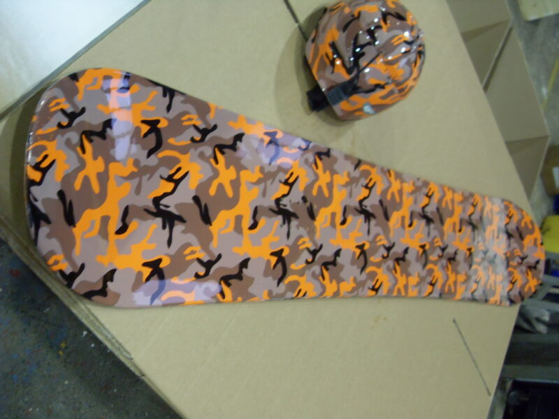 Snowboard And Protective Helmet Coated On Camouflage Hydrographic Film