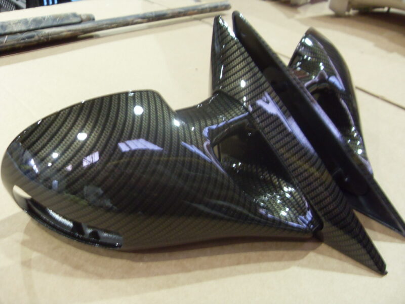 Car mirrors cover coated in carbon fibre hydrographic film painted black