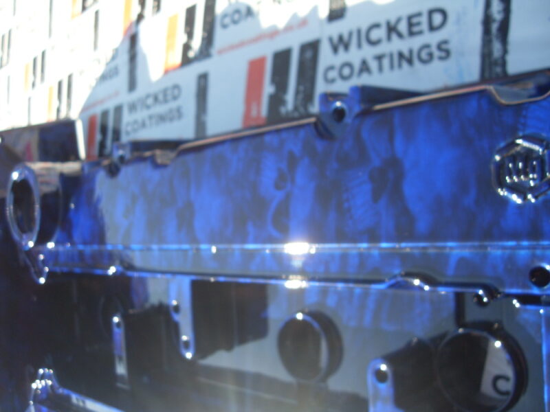 Car Engine Element Coated In Skull Hydrographic Film Painted Blue
