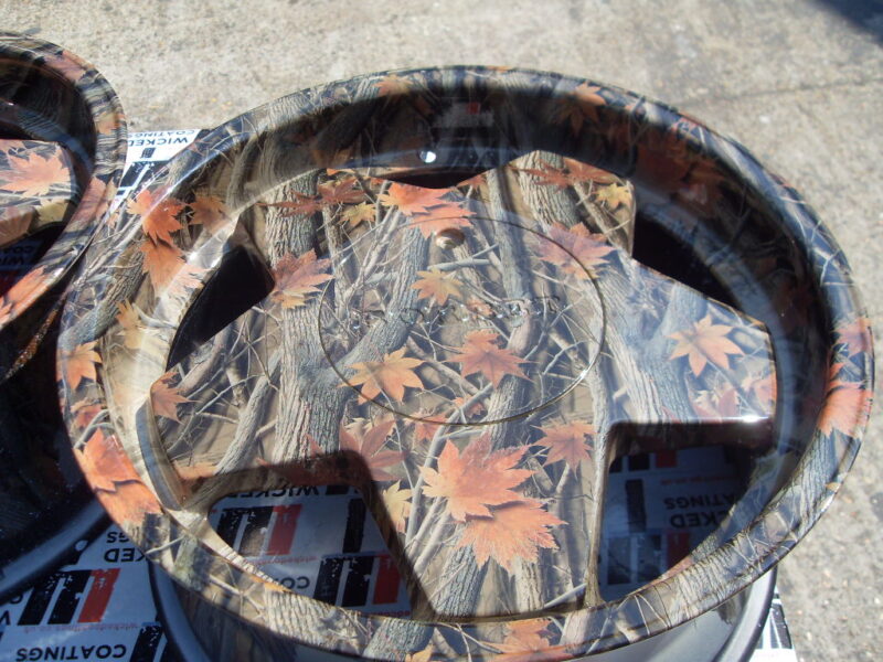 Car alloy wheels (Borbet A) coated in trees camouflage hydrographic film