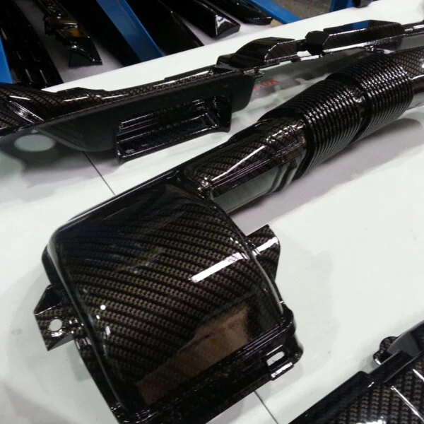 Car Engine Elements Coated In Carbon Fibre Hydrographic Film Painted Black
