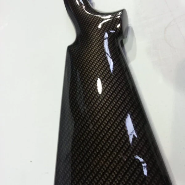 Gun elements coated in carbon fibre hydrographic film painted black