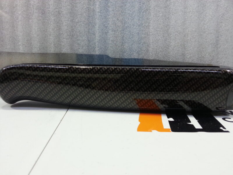 Gun elements coated in carbon fibre hydrographic film painted black