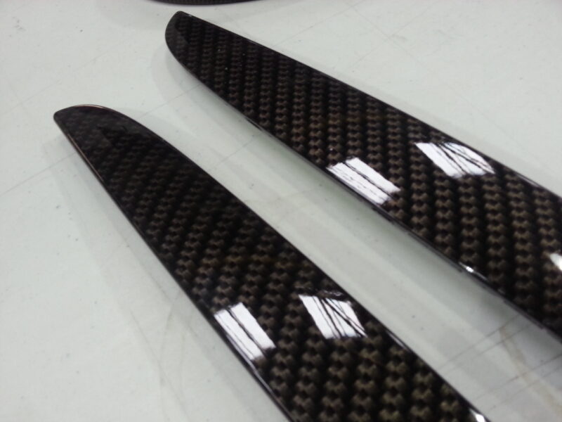 BMW exterior elements coated in carbon fibre hydrographic film painted black