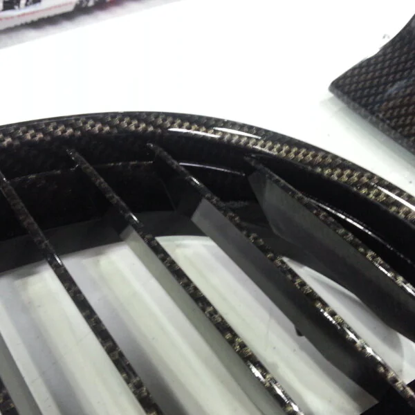BMW exterior elements coated in carbon fibre hydrographic film painted black