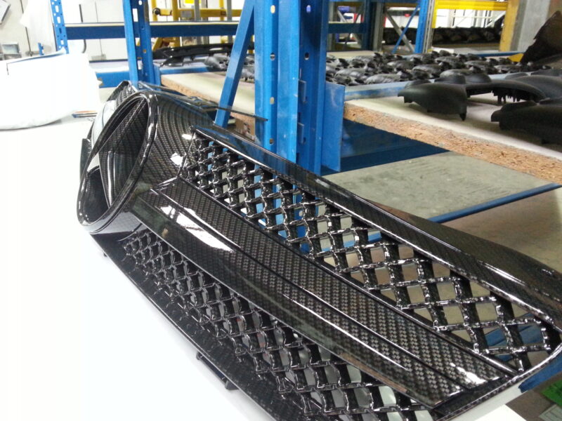 Mercedes radiator grill coated in carbon fibre hydrographic film painted black