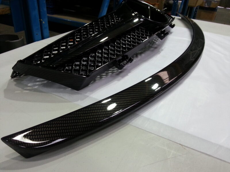Mercedes radiator grill coated in carbon fibre hydrographic film painted black