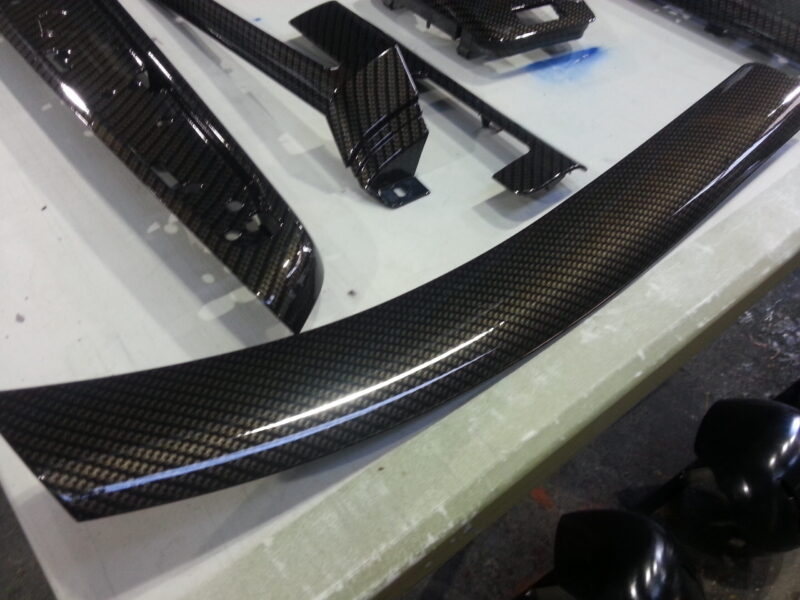 BMW interior various parts coated in carbon fibre hydrographic film painted black