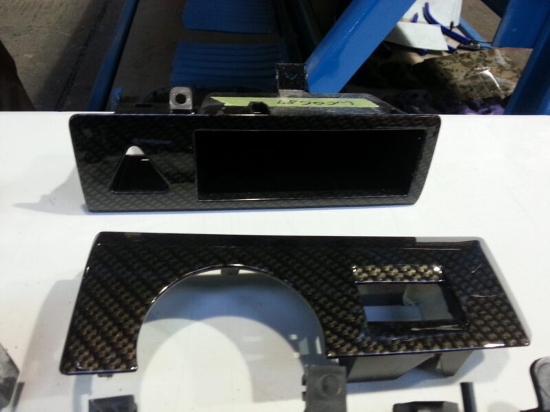Car interior various elements coated in carbon fibre hydrographic film painted black