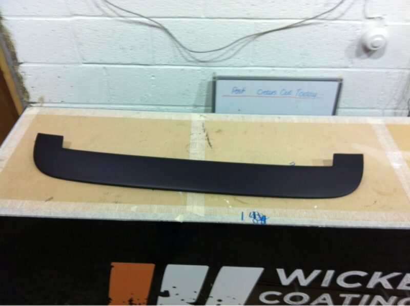 Car exterior element coated in carbon fibre