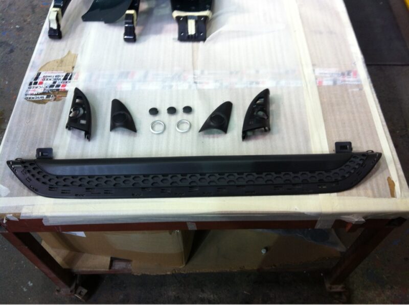 Car interior elements coated in carbon fibre