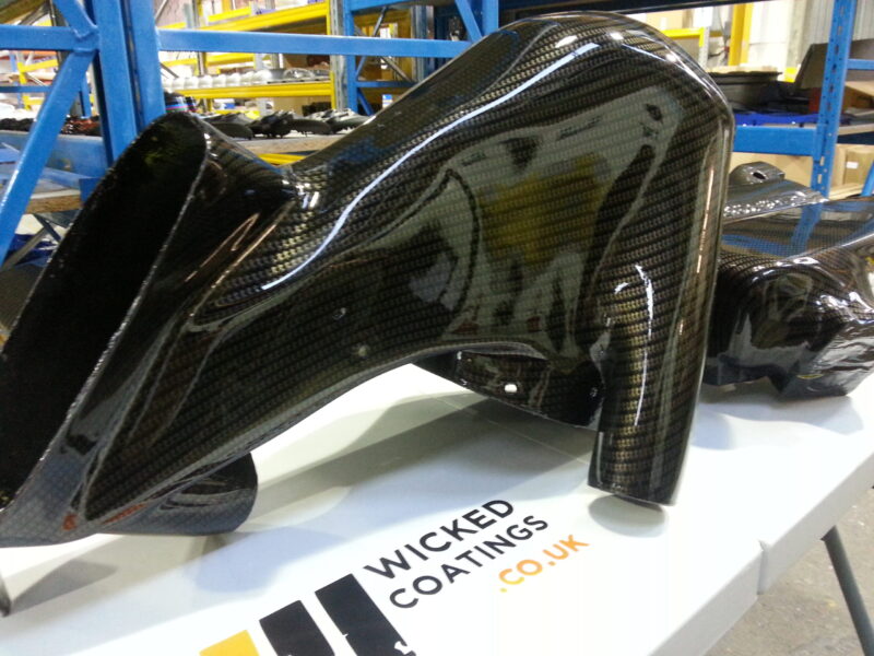 Ford Focus RS engine parts coated in carbon fibre hydrographic film painted black