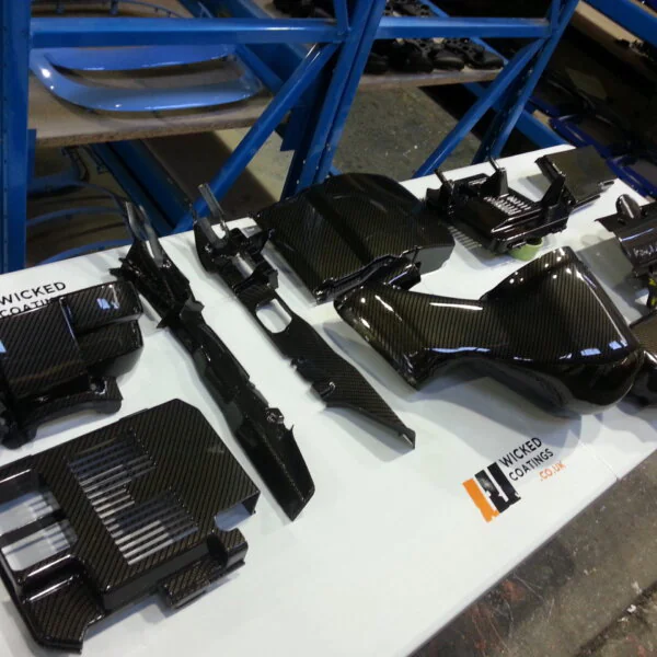 Ford Focus RS engine parts coated in carbon fibre hydrographic film painted black