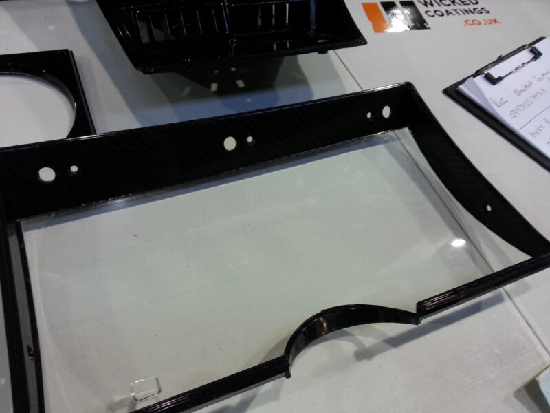 Car interior various elements coated in carbon fibre hydrographic film painted black