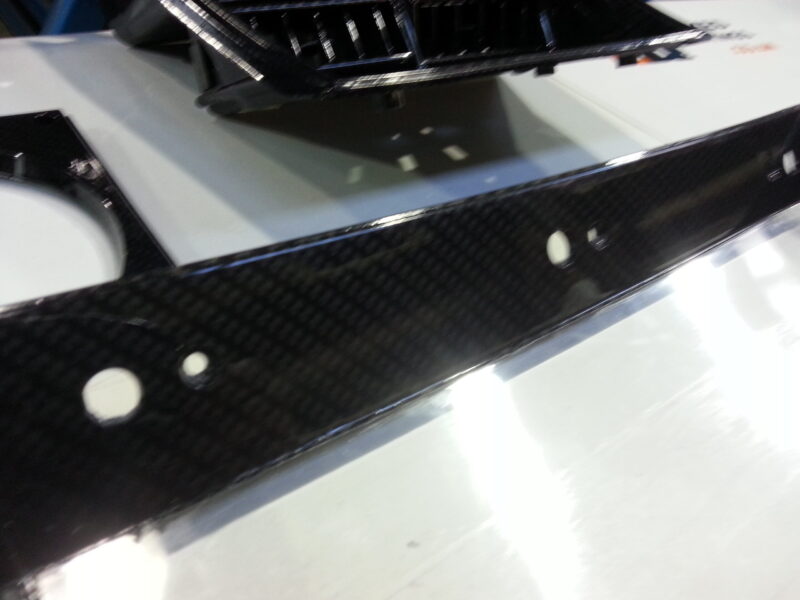 Car interior various elements coated in carbon fibre hydrographic film painted black