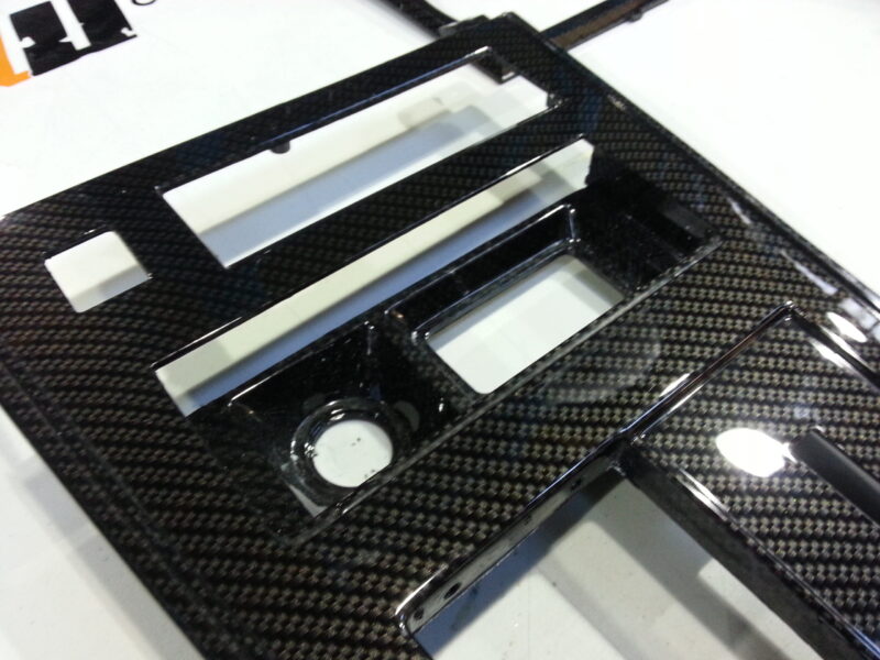 Car interior various elements coated in carbon fibre hydrographic film painted black