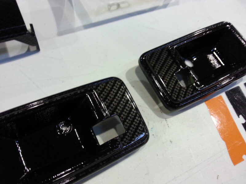 Car interior various elements coated in carbon fibre hydrographic film painted black