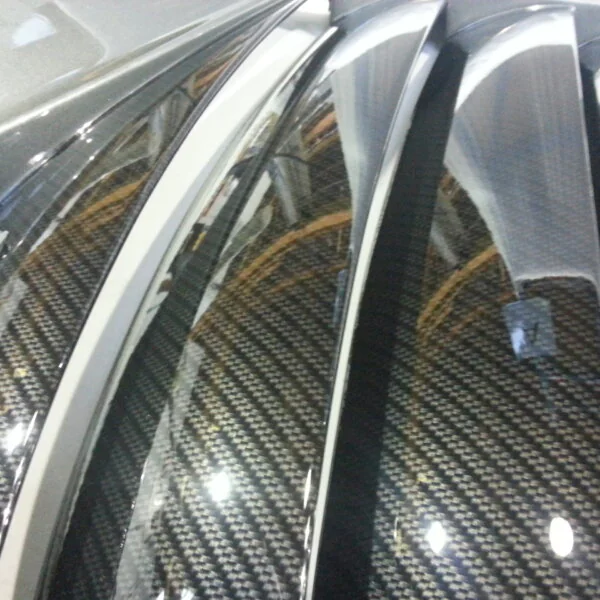 Car various elements coated in carbon fibre hydrographic film painted black