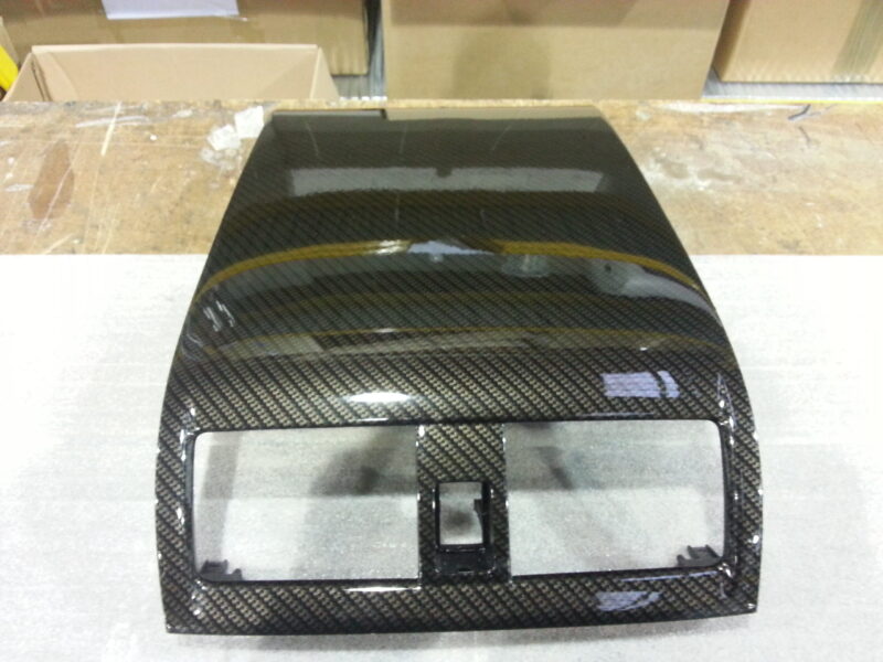 Car interior various elements coated in carbon fibre hydrographic film painted black