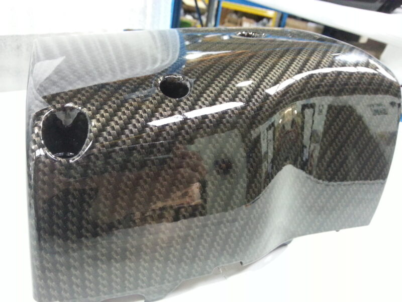Toyota Supra interior various elements coated in carbon fibre hydrographic film painted black