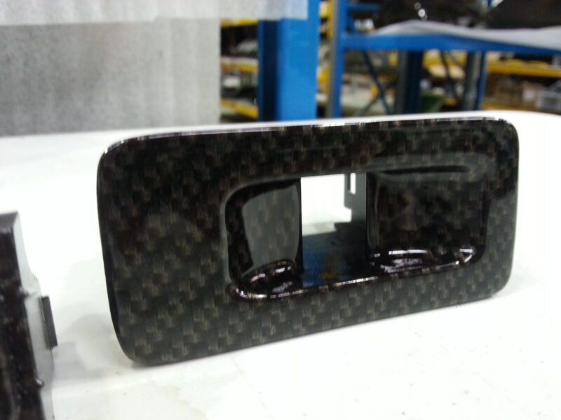 Toyota Supra interior various elements coated in carbon fibre hydrographic film painted black