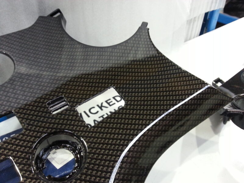 Toyota Supra interior various elements coated in carbon fibre hydrographic film painted black