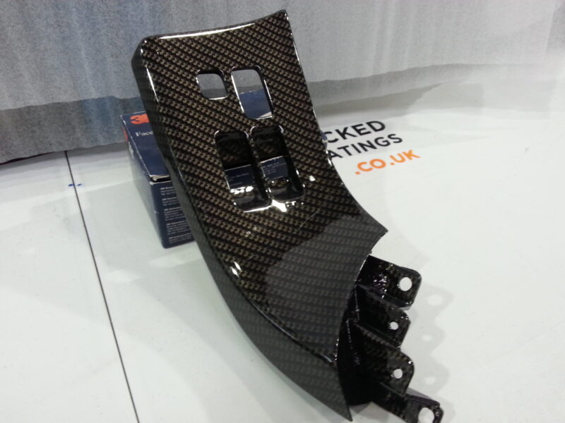 Toyota Supra interior various elements coated in carbon fibre hydrographic film painted black